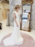 Mermaid V-Neck Cap Sleeves Backless Wedding Dresses with Ruffles OKM27