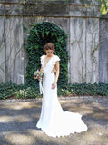 Mermaid V-Neck Cap Sleeves Backless Wedding Dresses with Ruffles OKM27