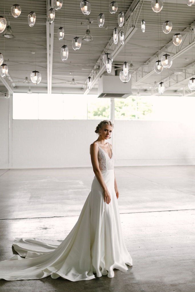 Elegant A-Line V Neck Spaghetti Straps Wedding Dress with Lace OKM90