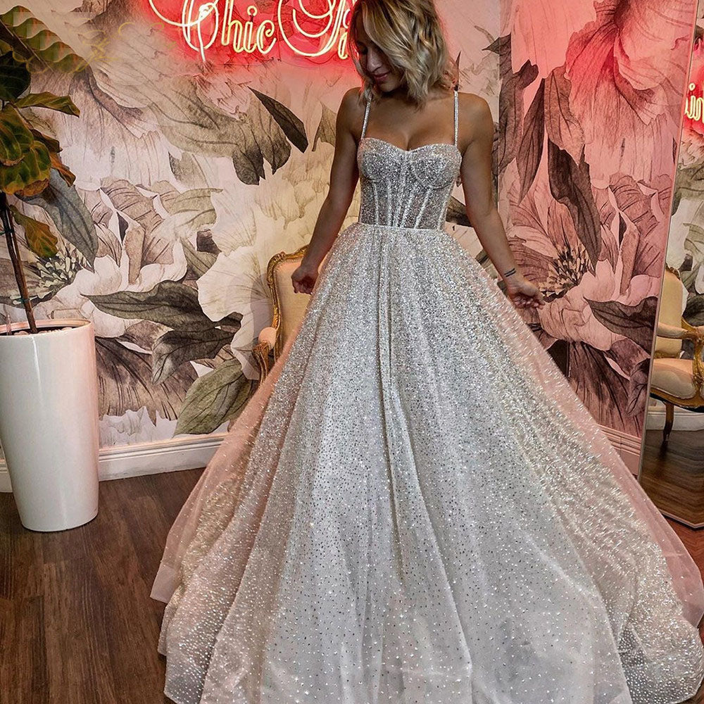 Sparkle Sleeveless Wedding Dress Kerstin Ball Gown Wedding Dress by Olivia  Bottega - WeddingWire.com