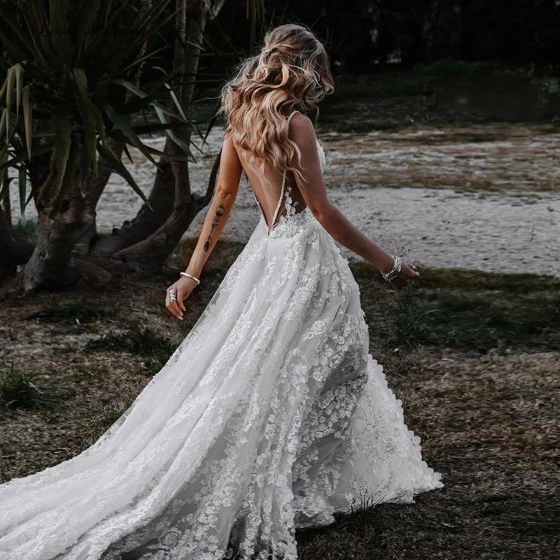Deep V Neck A line Lace Wedding Dress With Slit Spaghetti Straps